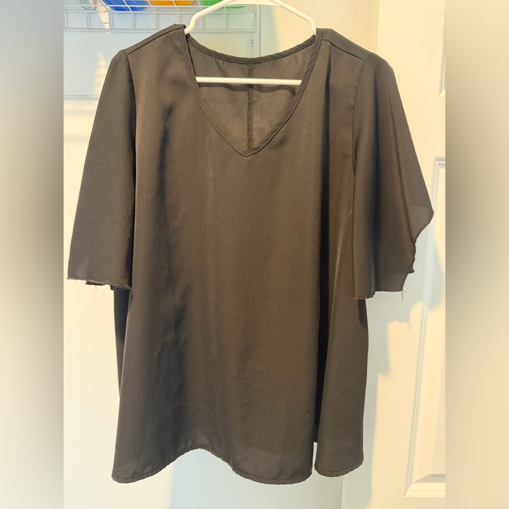 Women’s bat sleeve black top
